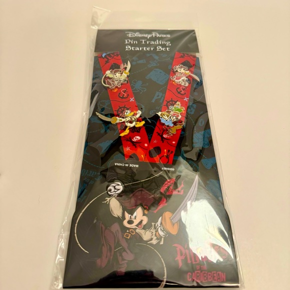 NWT. Disney 4 pin set plus lanyard. Pirates of the Caribbean theme - Picture 1 of 13